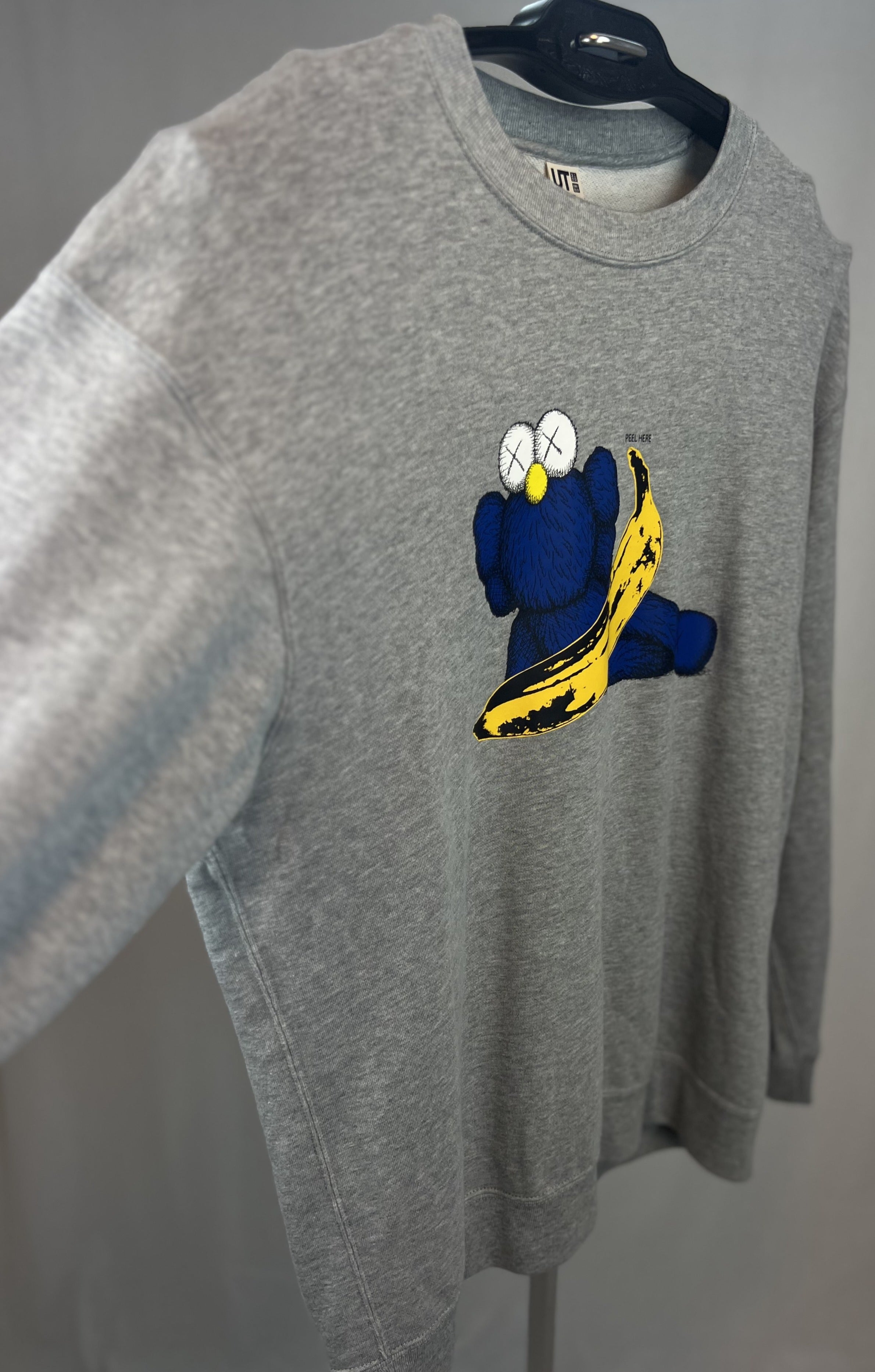 KAWS X Uniqlo X AW "Peel here" gray sweatshirt
