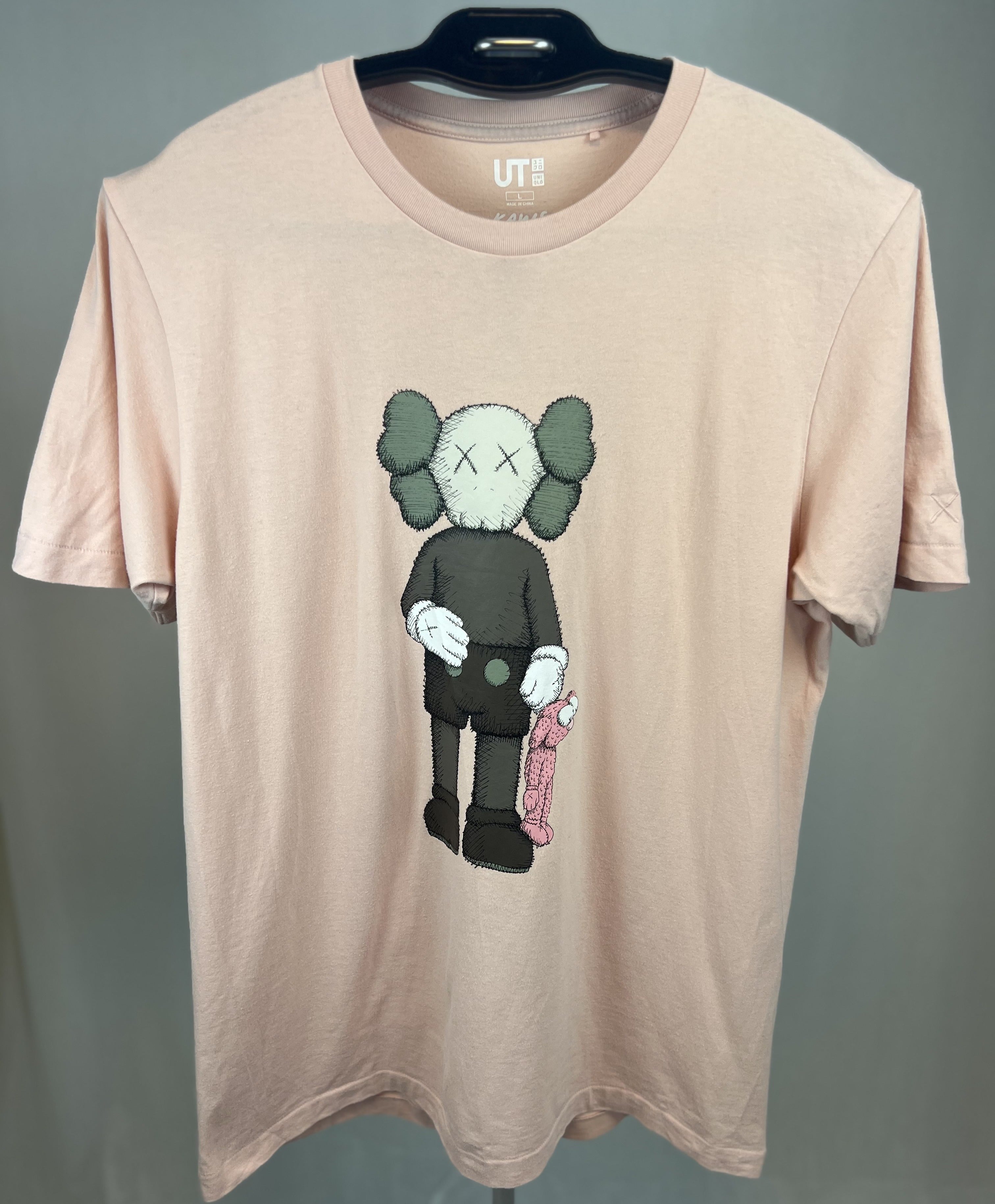 KAWS X Uniqlo Pink "teddy" tee