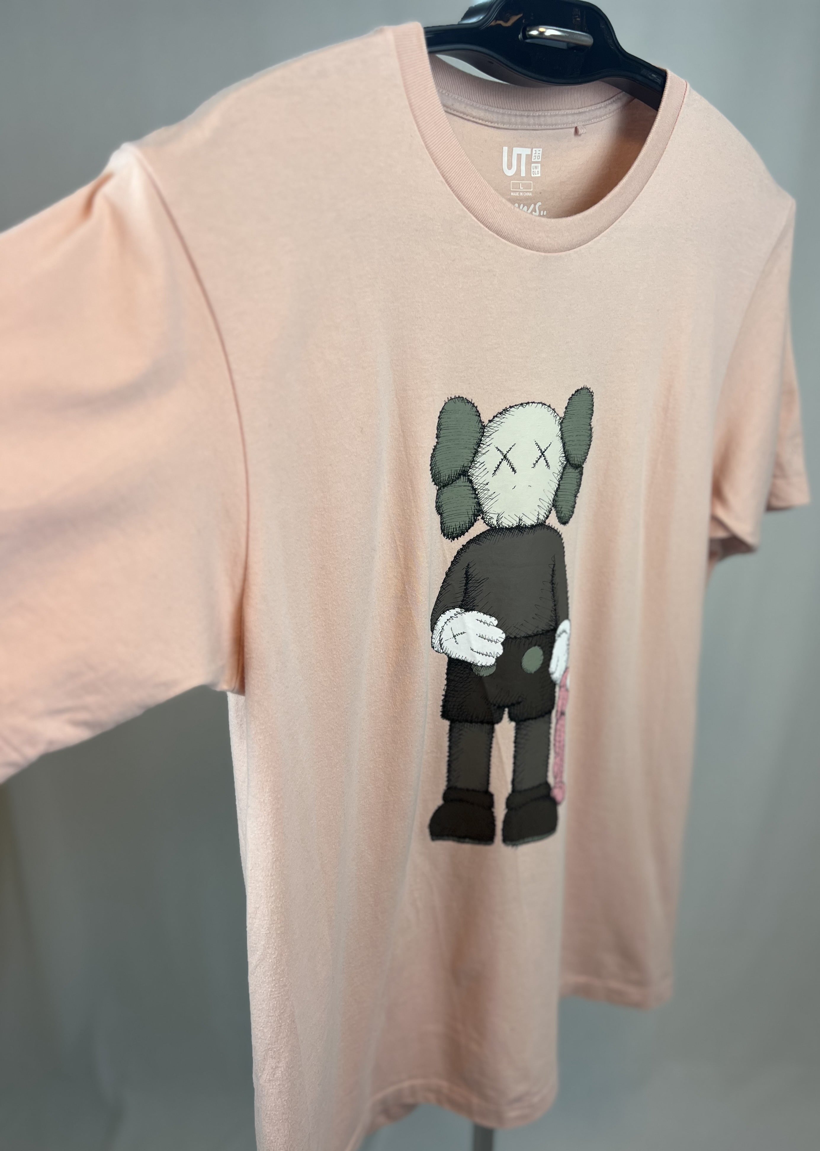 KAWS X Uniqlo Pink "teddy" tee